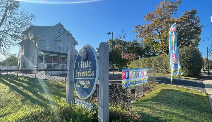 The Little Friends School sign on Edinburg Road on a sunny day